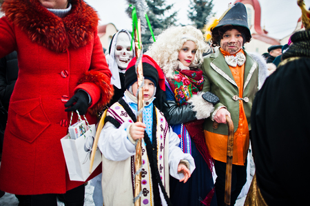 UKRAINE. LVIV - JANUARY 14, 2016: Christmas nativity scene parade of children on winter day.のeditorial素材