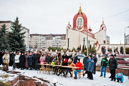 UKRAINE. LVIV - JANUARY 14, 2016: Christmas nativity scene parade of children on winter day.のeditorial素材