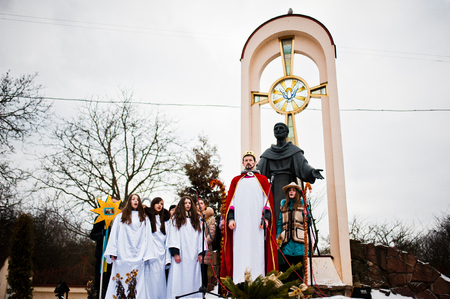 UKRAINE. LVIV - JANUARY 14, 2016: Christmas nativity scene parade of children on winter day.のeditorial素材