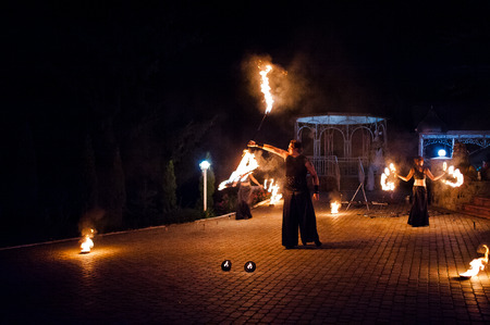 Amazing fire show on wedding ceremony at nightの写真素材