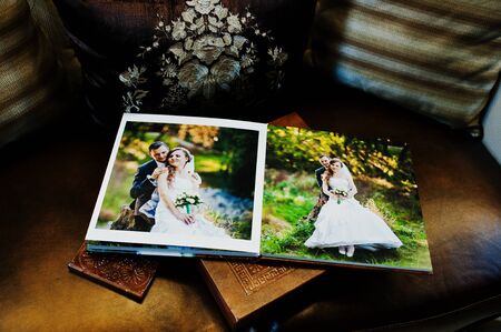 Dual pages of brown leather wedding book and albumの写真素材