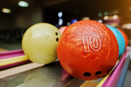 Two colored bowling balls of number 10 and 9の写真素材