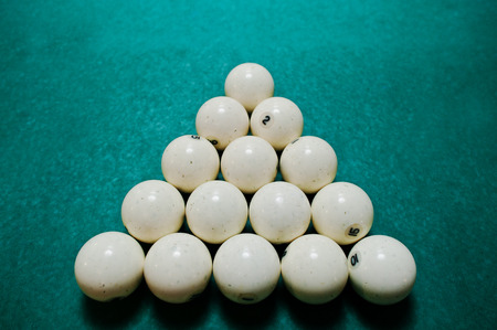 The russian billiards balls on the table