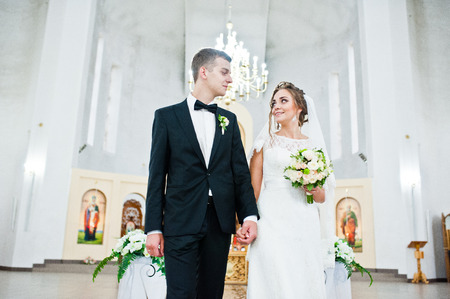 Wedding couple in love at churchの写真素材