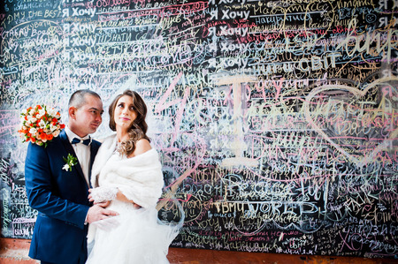 Lovely wedding couple background graffiti wall of love wordsの写真素材