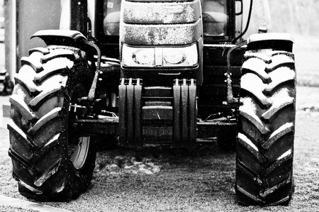 Wheels of new tractor in snowy weather