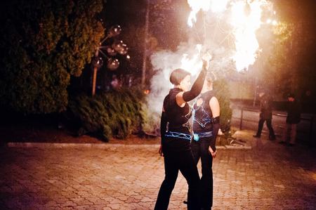 Presentable and awesome fire show at evening on wedding party.Photo with some noiceの写真素材