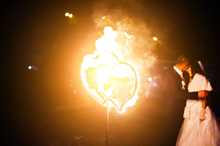 Wedding couple light fire heart  of loveの写真素材