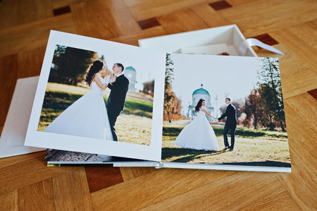 White leather wedding book or wedding album on wooden backgroundの写真素材