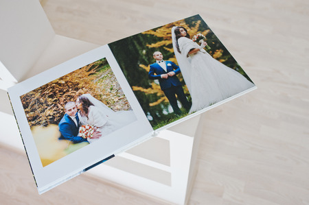 Dual pages of wedding photo book with wedding coupleの写真素材