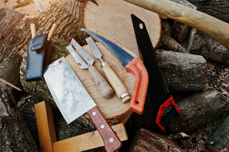 Wood working tools background chopped firewood.の写真素材