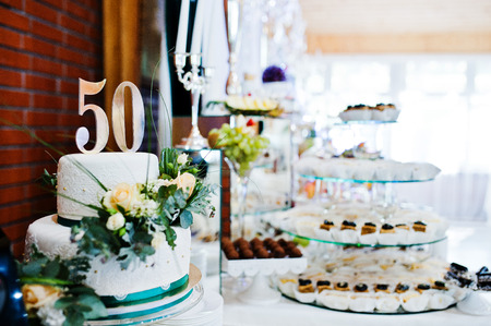 Cake anniversary in 50 at tableの写真素材