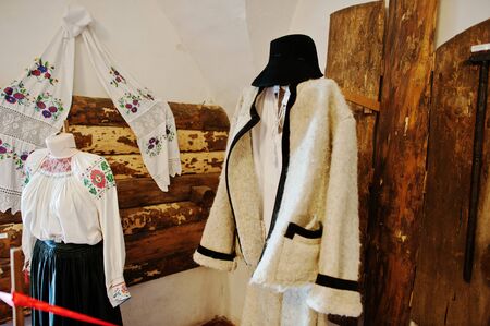 MUKACHEVO,UKRAINE - APRIL 11,2016: Elements of the old women's and men's traditional clothing at Palanok castle museumのeditorial素材