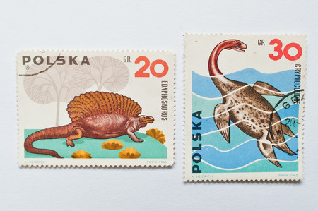 UZHGOROD, UKRAINE - CIRCA MAY, 2016: Collection of postage stamps printed in Poland shows dinosaur, circa 1965のeditorial素材