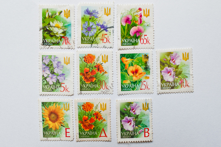 UZHGOROD, UKRAINE - CIRCA MAY, 2016: Collection of postage stamps printed in Ukraine, shows flowers series, circa 2000のeditorial素材