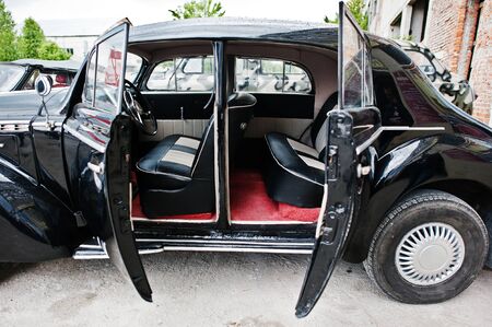 Car door open from the inside at vintage classic automobile.の写真素材
