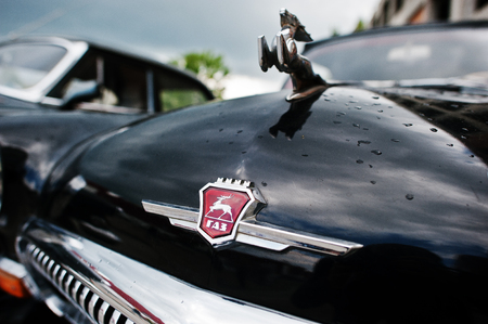 Podol, Ukraine - May 19, 2016: Logo deer mascot at classic soviet retro car GAZ-21 Volgaのeditorial素材