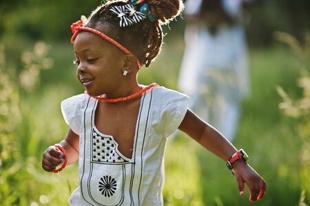 African baby girl walking at parkの写真素材