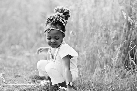 African baby girl walking at parkの写真素材
