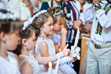 Mukyluntsi , Ukraine - 26 june, 2016: First holy communion.のeditorial素材