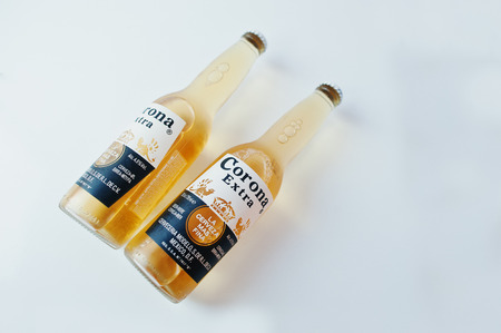 Hai, Ukraine - June 29, 2016: Two bottles of Corona Extra, top  beers worldwide produced by Cerveceria Modelo in Mexicoのeditorial素材