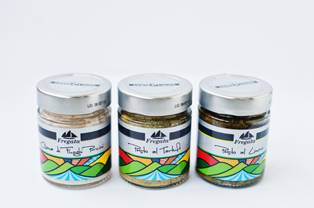 Athens, Greece - February 22, 2017: Row of different italian pickled in jar La Cerignola di una volta.のeditorial素材