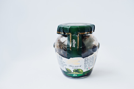 Athens, Greece - February 22, 2017: Italian black olives baked pickled in jar La Cerignola di una volta.のeditorial素材