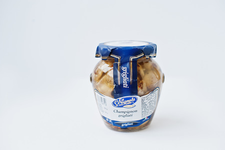 Athens, Greece - February 22, 2017: Italian grilled button mushrooms pickled in jar La Cerignola di una volta.のeditorial素材
