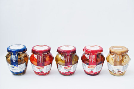 Athens, Greece - February 22, 2017: Row of different italian pickled in jar La Cerignola di una volta.のeditorial素材