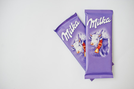 Dusseldorf, Germany - February 18, 2017: Two chocolates Milka on white background.のeditorial素材