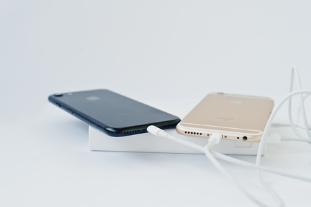 Hai, Ukraine - March 1, 2017:  Xiaomi power bank 20000 mah with Apple Iphone 7 and 6S isolated on...