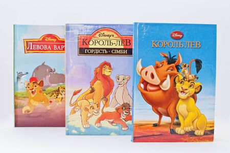 Hai, Ukraine - February 28, 2017: Animated Disney movies cartoon production book sets Lion King on white background.のeditorial素材