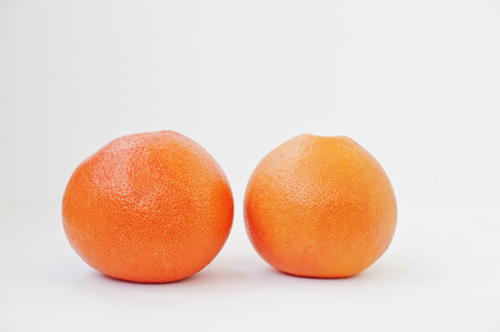 Citrus fruits grapefruit isolated on white background. Healthy eating dieting food.の写真素材