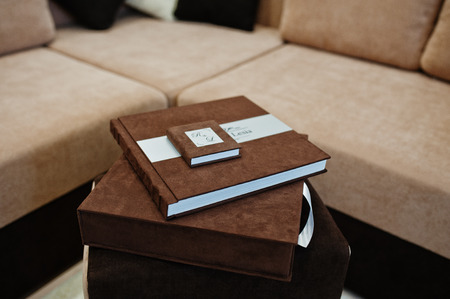 Brown textile wedding book with flash box.の写真素材