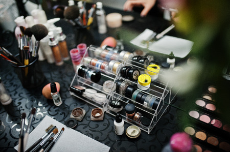 Professional makeup tools and products on the table in the beauty salon.の写真素材