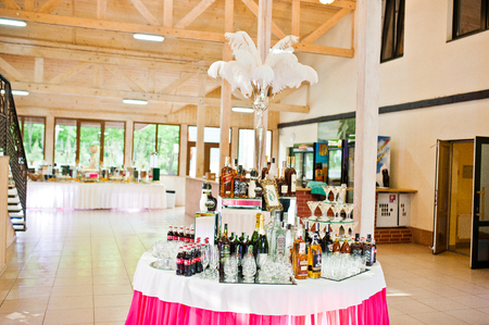 Hai, Ukraine - August 10, 2017: huge variety of alcohol drinks and beverages in the restaurant on a banquet.のeditorial素材