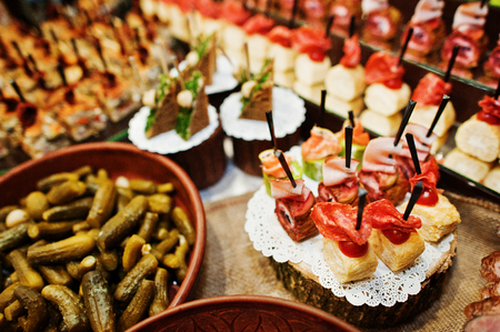 Huge variety of delicious and colorful meals on wedding banquet.の写真素材