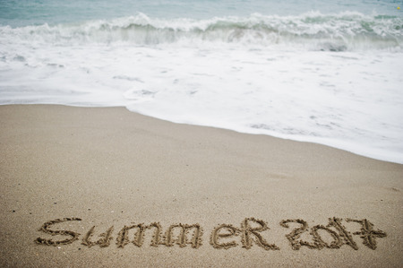 Summer 2017 end. New Year 2018 is coming concept. Sea and sand.の写真素材