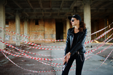 Sexy female agent at abandoned place.の写真素材