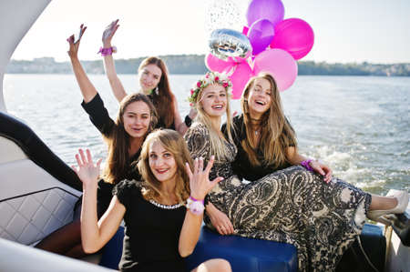 Girls having fun at yacht on hen party.の写真素材