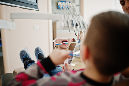Little boy at dentist chair. Children dental.の写真素材
