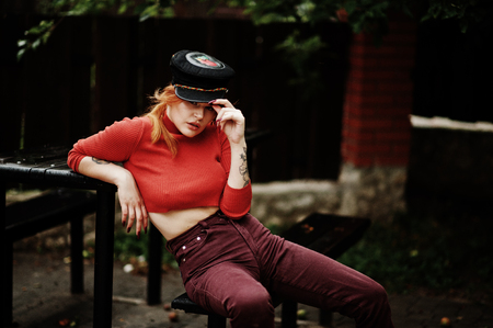 Fashion portrait of redhaired sexy girl outdoor. Model attractive seduction woman.の写真素材