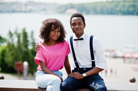 Stylish and trendy african american couple posed at street of city.の写真素材