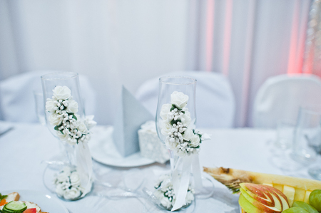 Close-up photo of wedding cutlery on the decorated table.の写真素材