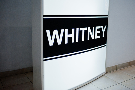 Hai, Ukraine - July 10, 2018: Big poster saying whitney on the wall in the shop.のeditorial素材