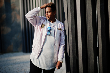 Stylish hipster arab man guy posed outdoor in street. Style rap singer.の写真素材