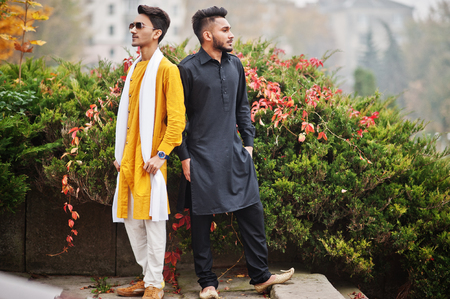 Two indian stylish mans friends in traditional clothes posed outdoor.の写真素材