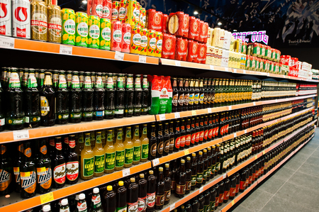 Kyiv, Ukraine - December 19, 2018: Different bottles of beer on supermarket stand shelves.のeditorial素材