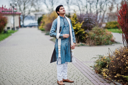 Indian man wear on traditional clothes with white scarf posed outdoor.の写真素材