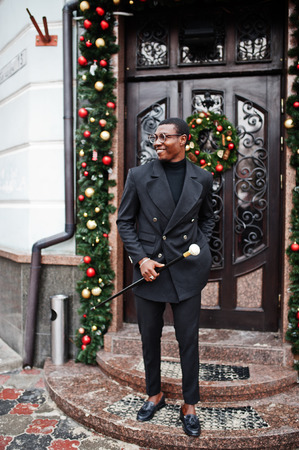 Stylish african american gentleman in elegant black jacketの写真素材